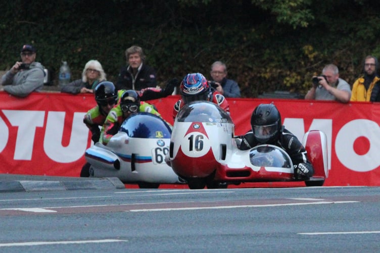 Ben Birchall and TT podcaster presenter Chris Pritchard (750 BMW), followed by Greg Lambert and Andy Haynes (1972 1000 BMW) (Photo: Mike Hammonds)