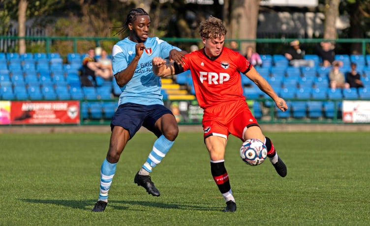 Dean Pinnington (right), seen here in action against Litherland REMYCA recently, scored one of FC Isle of Man's goals against league leader Padiham at the Bowl on Saturday afternoon (Photo: Hannah McHugh)