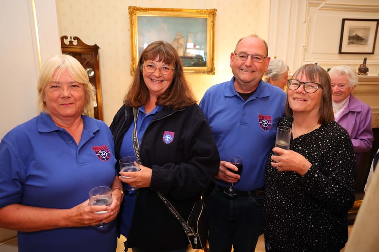 Members of the Friends of TT Riders Association enjoy a drink at the reception