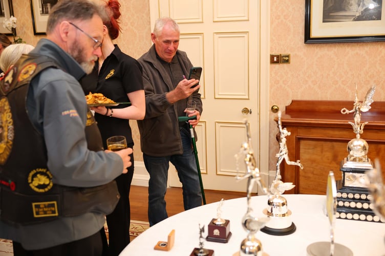 Many enjoyed looking that bit closer at the Manx Grand Prix trophies
