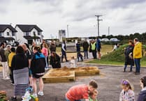 Crowds enjoy natural play area opening in Isle of Man estate despite rainy weather