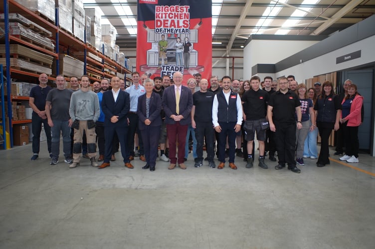 The Lieutenant Governor with Howdens staff and customers during the reopening of the depot