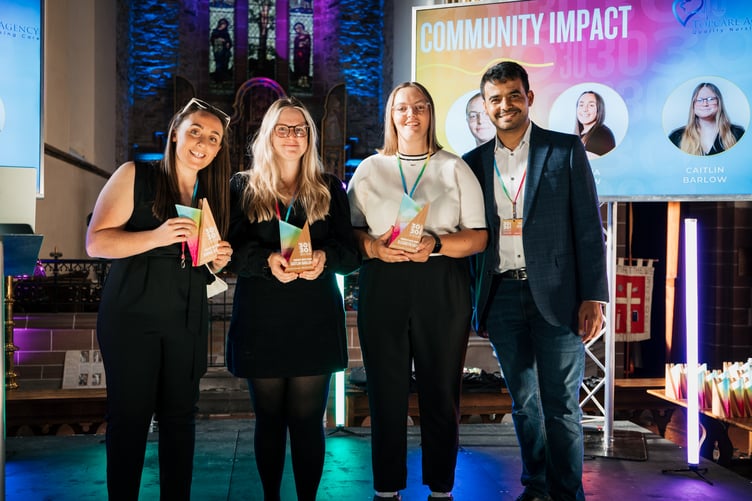 Sal Heddi of TopCare Nursing Agency with this year's Gef 30 Under 30 Community Impact category winners