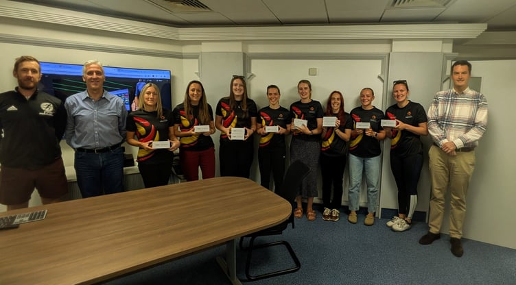 The Isle of Man netball squad receives their heart-rate monitors from Myzone Holdings Limited