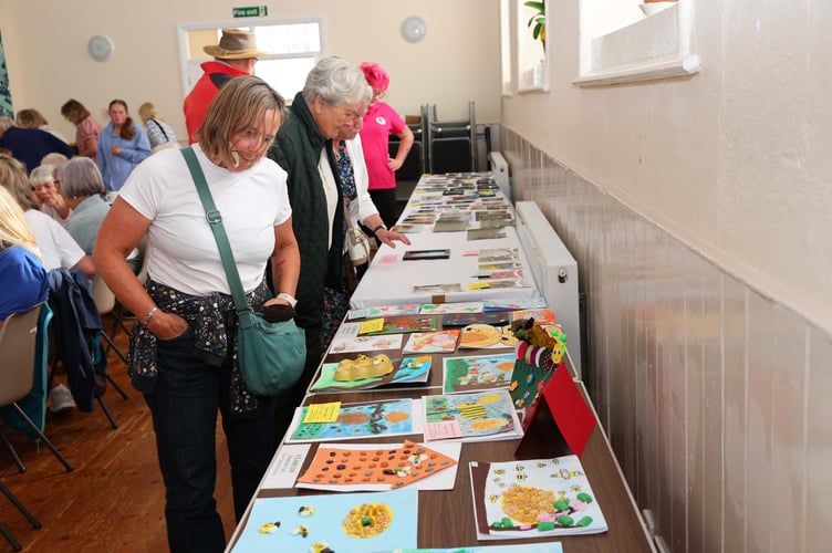Crowds make their way around the exhibitions at the Methodist Hall on Saturday
