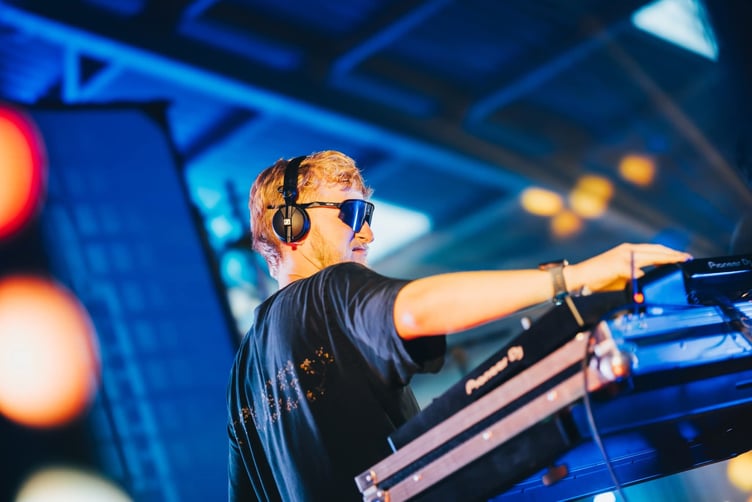 Resident DJ Cal Davies lit up the stage at Full Moon Festival 2025 – and he’ll be back on the island for the Half Moon Festival, much to the delight of organiser Scotty Bradshaw and festival-goers alike