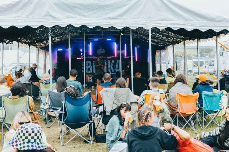 Nathan Thompson performing in the Burka Tent at Full Moon Festival 2025