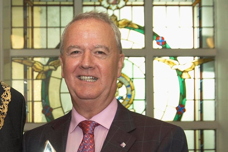 MADF chairman Michael Lees presents Douglas Mayor Ritchie McNicholl with an engraved star commemorating the federations diamond jubilee