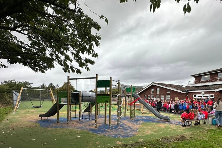 Pupils eagerly waiting for the opening of the new playground at Marown Primary School on Tuesday