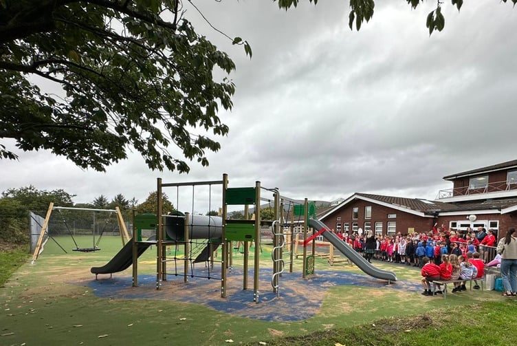 Pupils eagerly waiting for the opening of the new playground at Marown Primary School on Tuesday