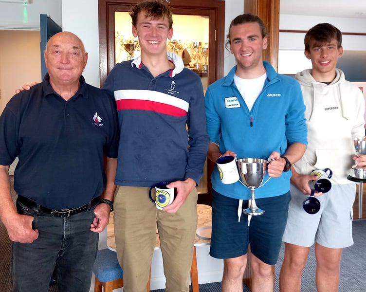 Pictured at the prize presentation for the 2025 Isle of Man Dinghy Championship are (from left to right): principal race officer Mick Kneale, runner-up Peter Cope, overall winner Teddy Dunn and third-placed Thomas Watterson