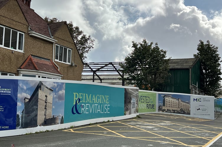 No.40 Westmoreland Road (left) is earmarked for demolition while the former car repair centre behind has already been reduced to a steel frame