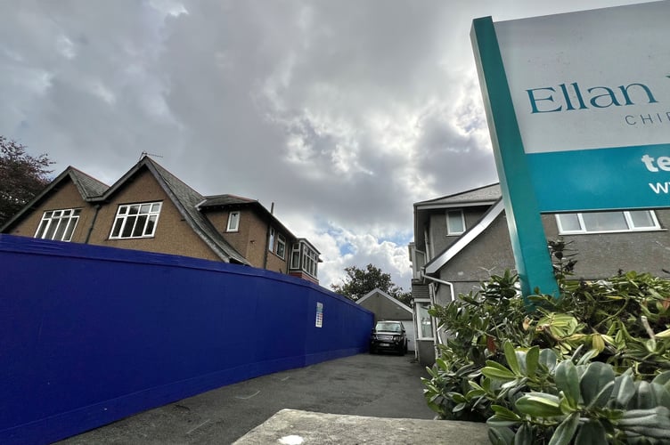 Blue hoardings mark out demolition site next to Ellan Vannin Chiropractic Clinic