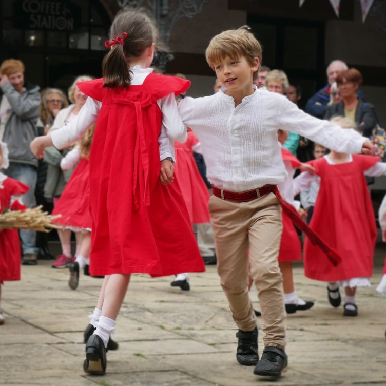 Young members of Perree Bane dancing outside the House of Manannan in Peel