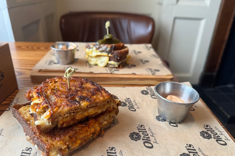 The new toasties at The Queen's in Douglas. Pictured are the 12-hour Manx pork (closest) and the the Manx Three Cheese toastie