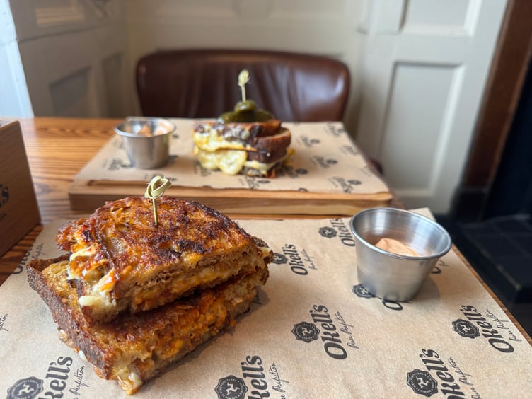 The new toasties at The Queen's in Douglas. Pictured are the 12-hour Manx pork (closest) and the the Manx Three Cheese toastie