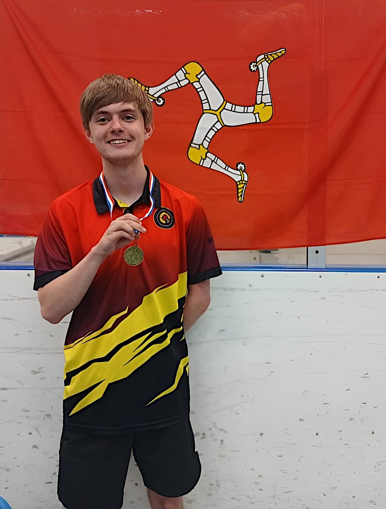 Fredrik Sime with his rifle shooting gold medal