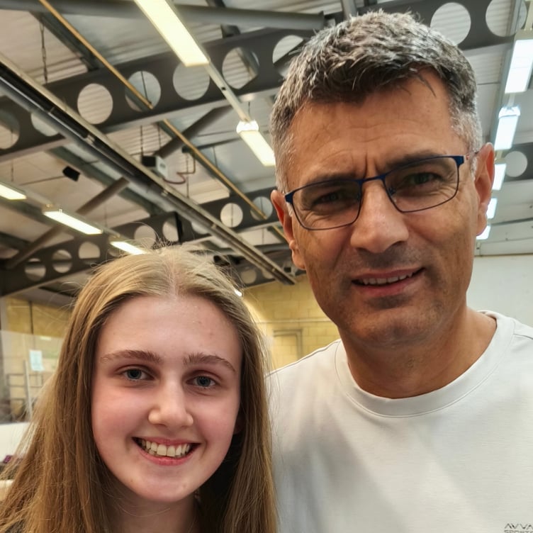 Kathryn Holden with Turkish shooter Yusuf Dikec, who went viral on the internet after last summer's Olympics in Paris