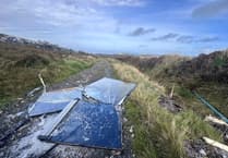 Fly-tipping warning after glass panels left strewn on country lane