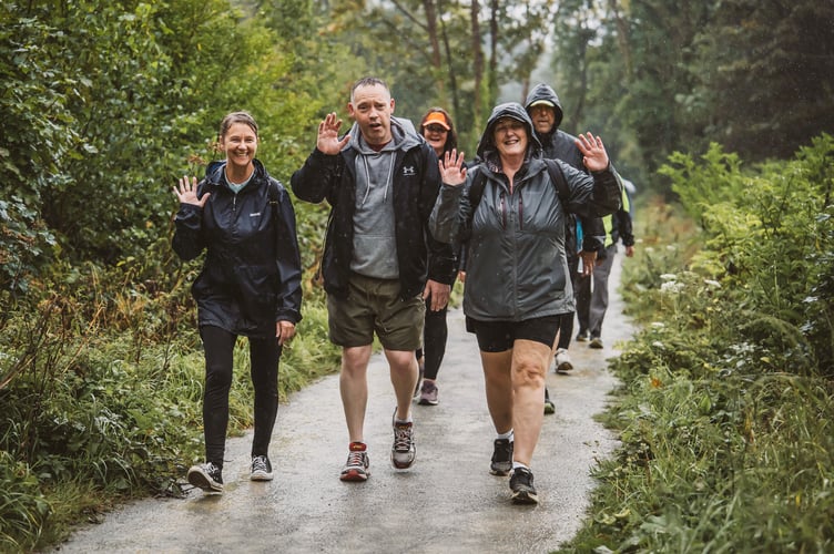 All smiles despite the heavy rain
