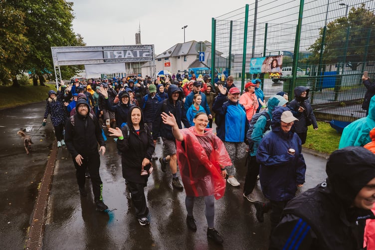 More than 250 took part in the walk despite the conditions