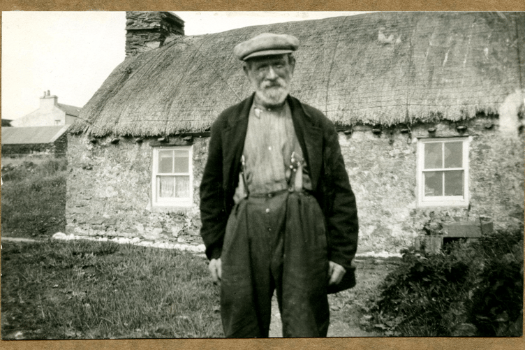 Harry Kelly outside his Cottage