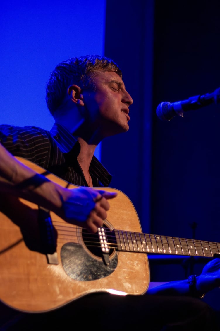 Local musician Patrick Knight takes to the stage