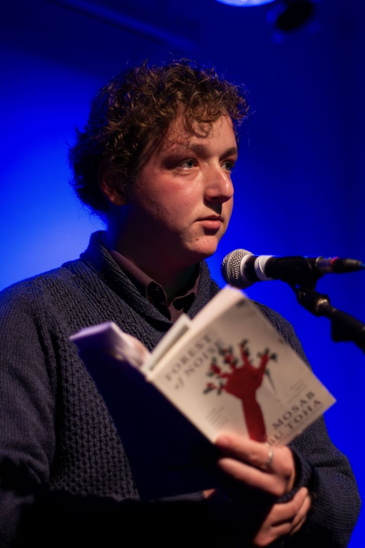 Matthew Warren performs poetry
