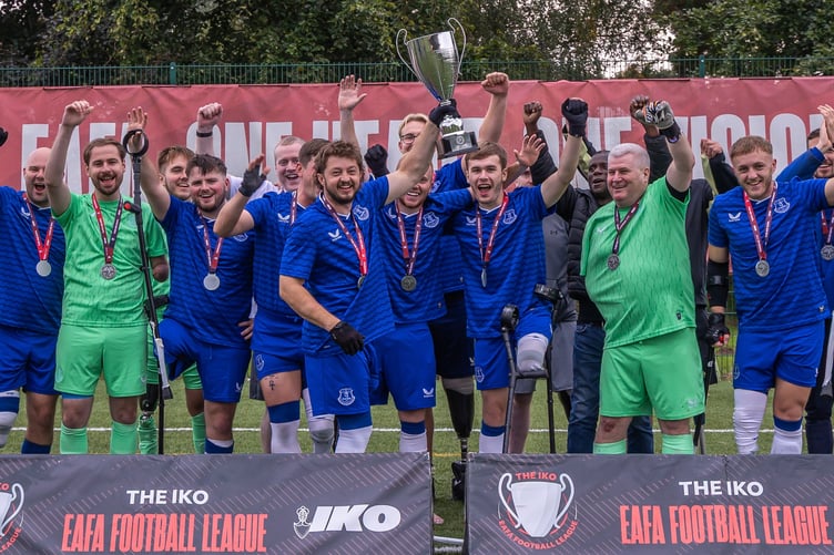 Sean Jackson (far right) celebrates with his England team-mates on Saturday (Photos: PDR Photos)