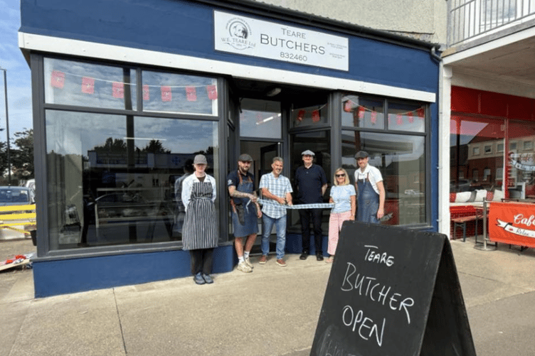 President of Tynwald Laurence Skelly cuts the ribbon at the opening of Teare Butchers in Port Erin back in August