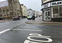 Police at the scene of crash as road partially blocked