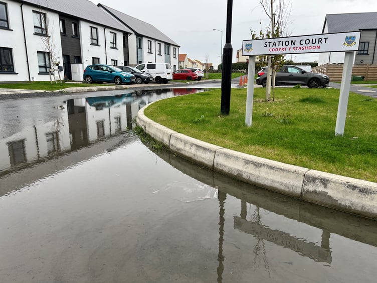 Flooding at junction of Station Court and Railway Court, The Meadows
