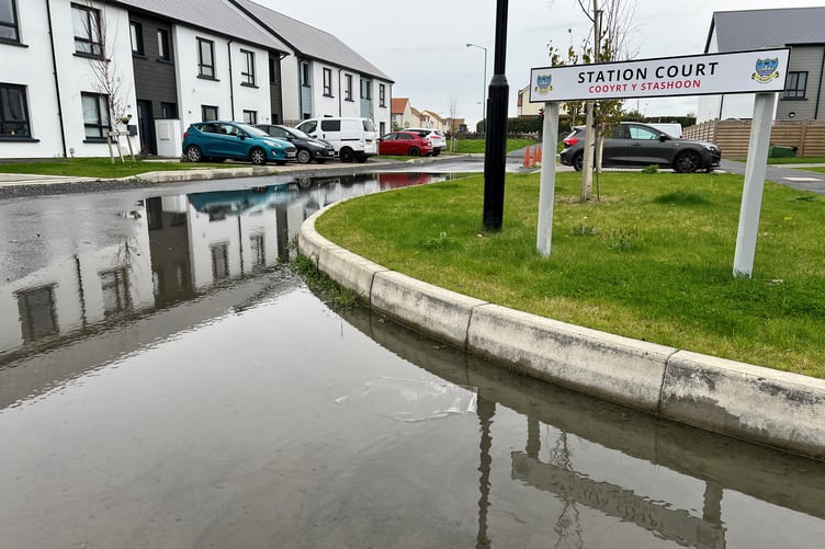 Flooding at junction of Station Court and Railway Court, The Meadows