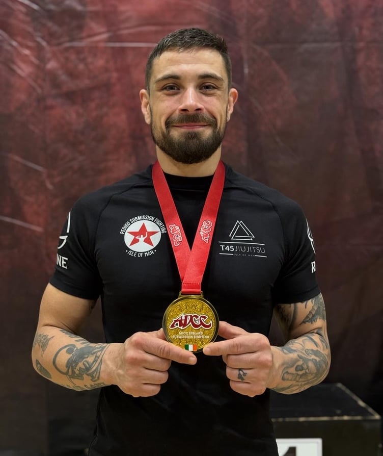 T45 Jiu-Jitsu Isle of Man coach Myles Joughin with his gold medal which he won in the masters pro division at the DCC Irish Open Championships recently