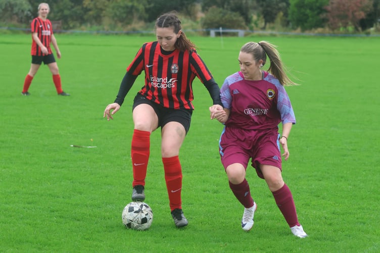 Malew's Hannah Leece and Union Mills Kelly Watterson (right) in action at Garey Mooar on Sunday (Photo: Paul Hatton)