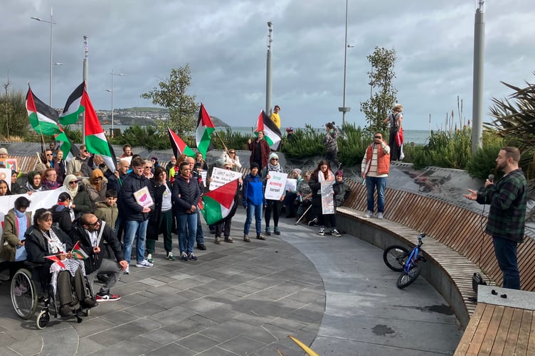 People in Douglas gather outside the Gaiety in protest against Israel's military offensive in Gaza