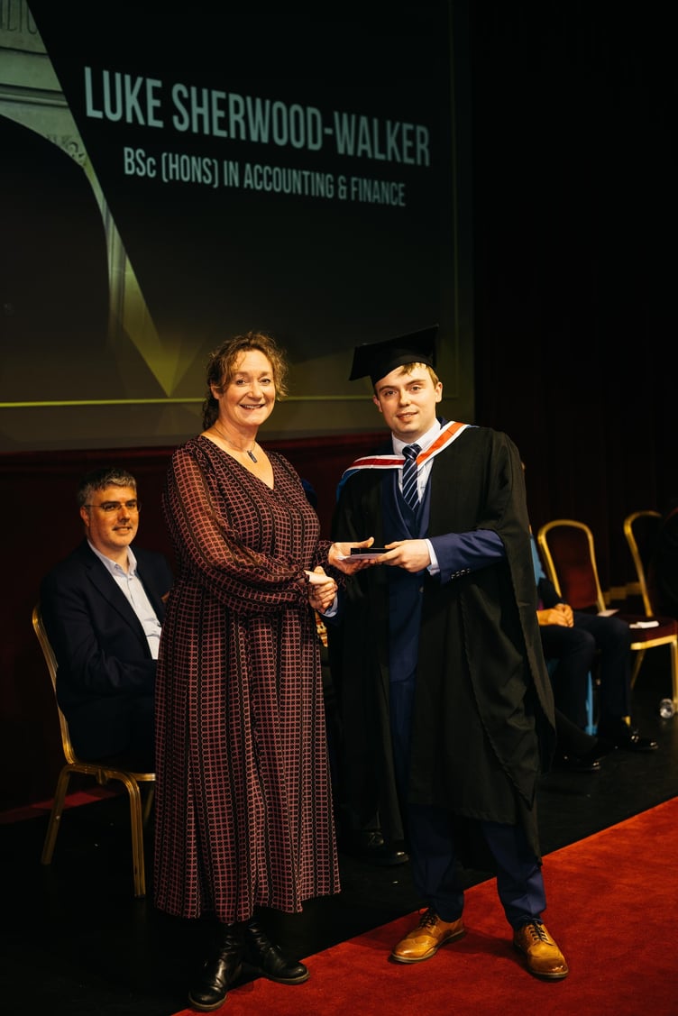 Minister Daphne Caine MHK presenting the 2025 Liam Arrowsmith Higher Education Student of the Year Award to Luke Sherwood-Walker