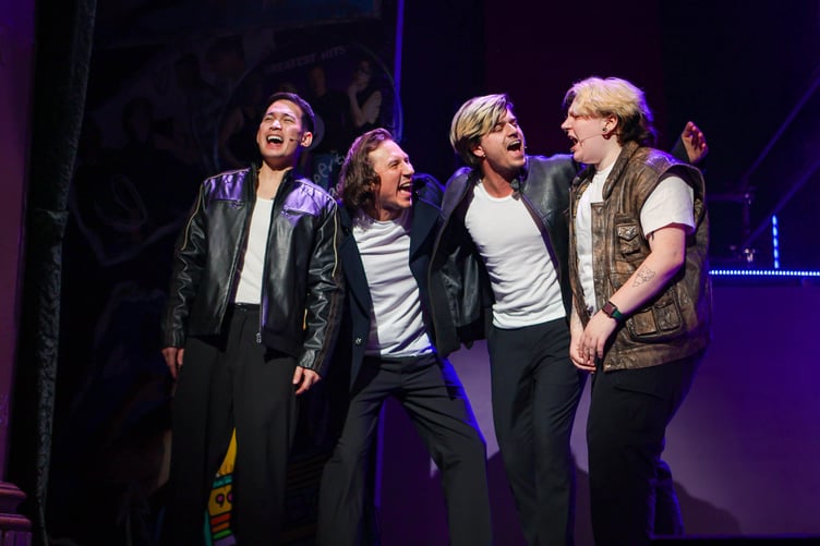 Take That put their vocal chords to work