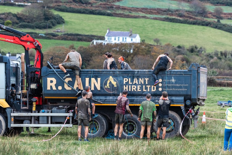 Rope climbs over a truck