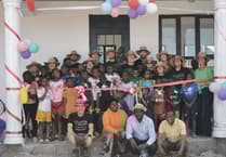 Staff make final visit to orphanage secured through firm's fundraising