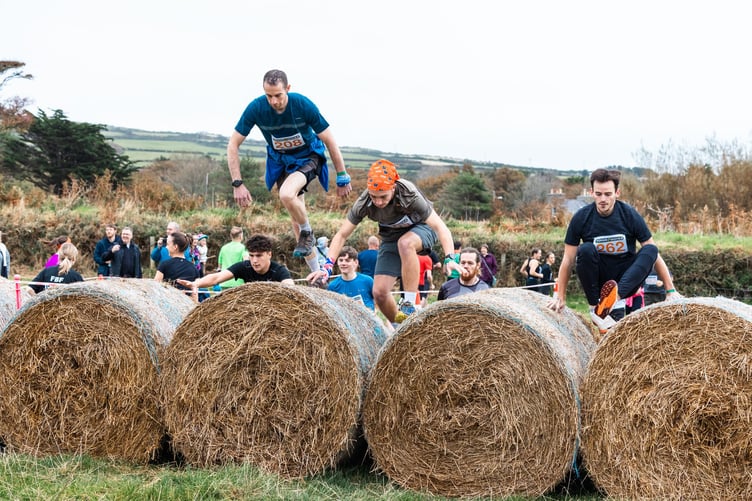 Jumping over hay bales