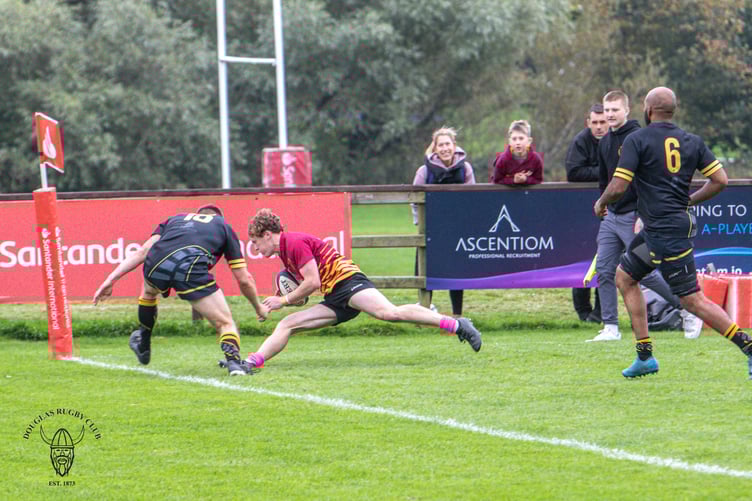 Kyle Martin scores out wide for Douglas (Photo: Richard Ebbutt)
