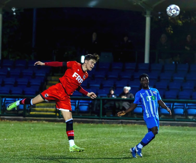 FC Isle of Man attacker Charlie Higgins rises high to power a header into the net against FC St Helens at the Bowl on Saturday evening. The goal put the Ravens 2-0 up before the visitors hit back to salvage a 2-2 draw (Photo: Hannah McHugh)