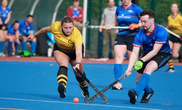 Rachael Middleton of Harlequins A and Alex Kneale from Valkyrs A stretch for the ball during the two sides' Cup clash at the NSC on Saturday afternoon. The latter team edged the contest 2-1 (Photo: Dave Norton)