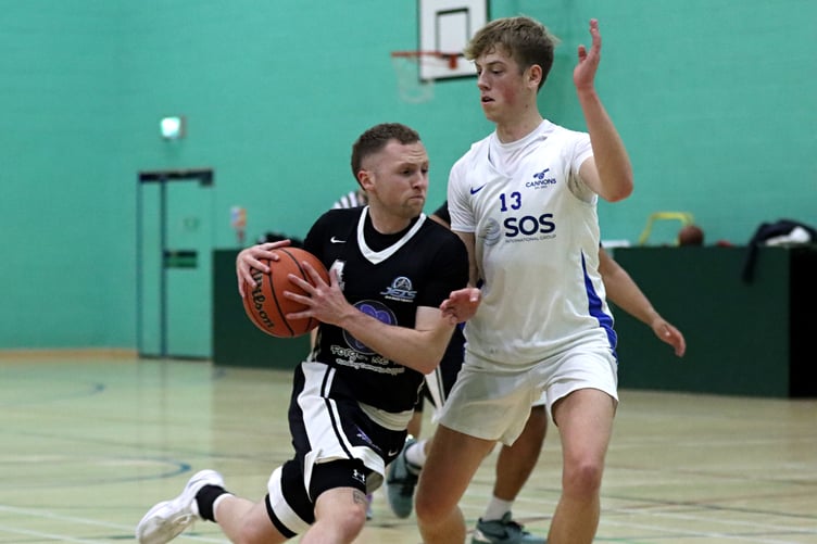 Jets' Tom Dalton-Brown drives against Cannons Elite's Jack Wilkinson during the pair's clash in the Senior League last week (Photo: Dave Norton)
