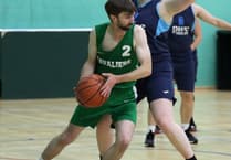 Cavs edge past Hoops as new basketball season tips off