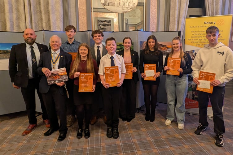 Captain of the Parish of Rushen Paul Costain, Rotary Club President David Scott and the winners