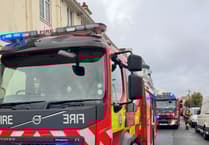 Fire crews tackle house blaze after residents alerted by smoke alarm