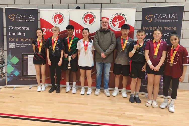 The mixed doubles medallists at the weekend's under-17 badminton tournament with Gavin Parry from sponsor Capital International