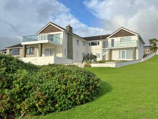UK sanctions owner of homes raided in FBI operation